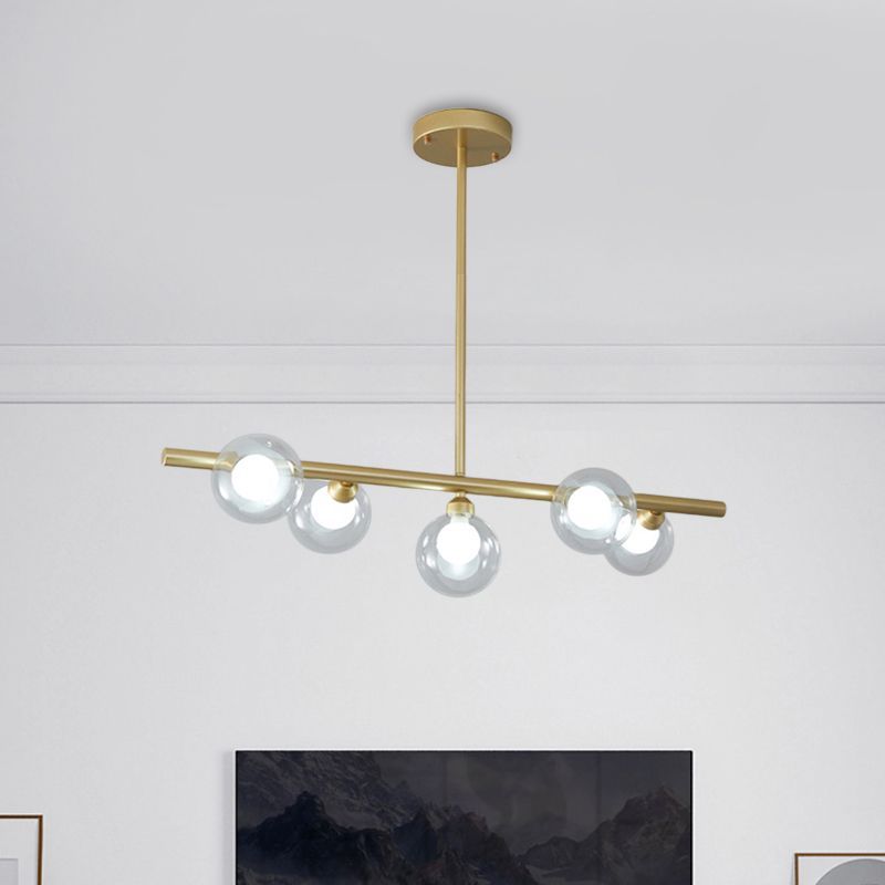Valentina Nordic pendant light with gold finish and glass globes