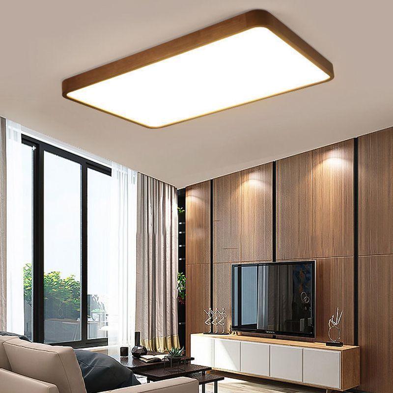 Modern walnut LED ceiling light in living space.