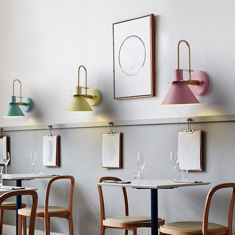 Morandi wall lamps in colorful shades, restaurant interior decor