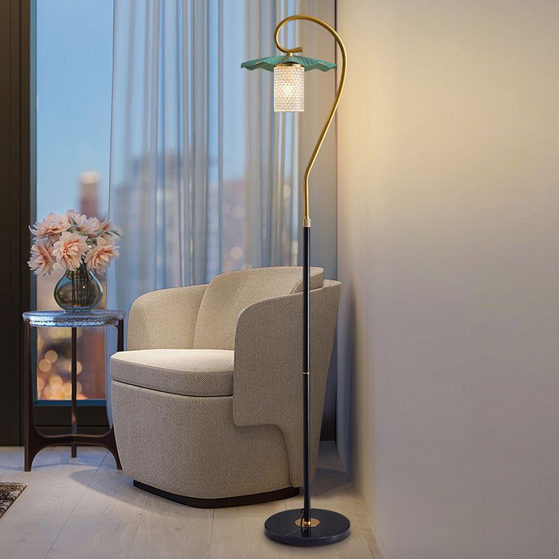 Carins Lotus Floor Lamp beside modern armchair, home decor