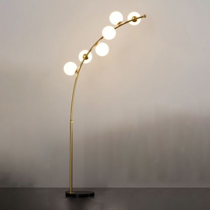 Gold arc floor lamp with bubble shades. Las Sola lighting solution. Valentina Modern Arc Multi Head Bubble Floor Lamp