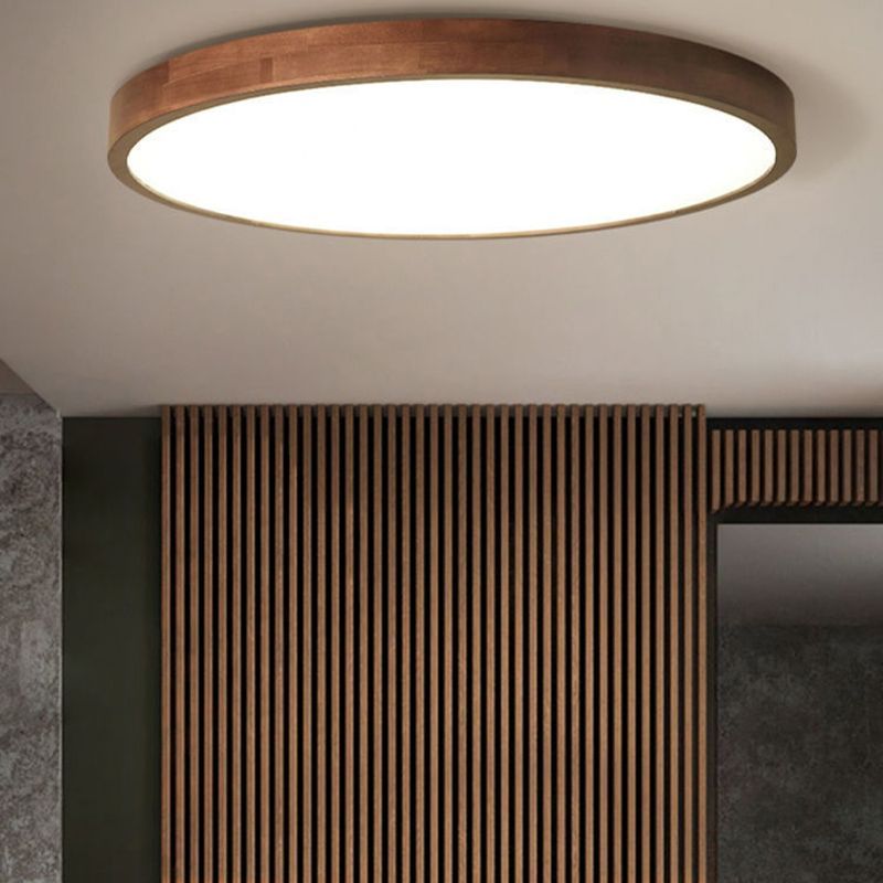 Walnut LED flush mount ceiling light. Modern lighting in interior.