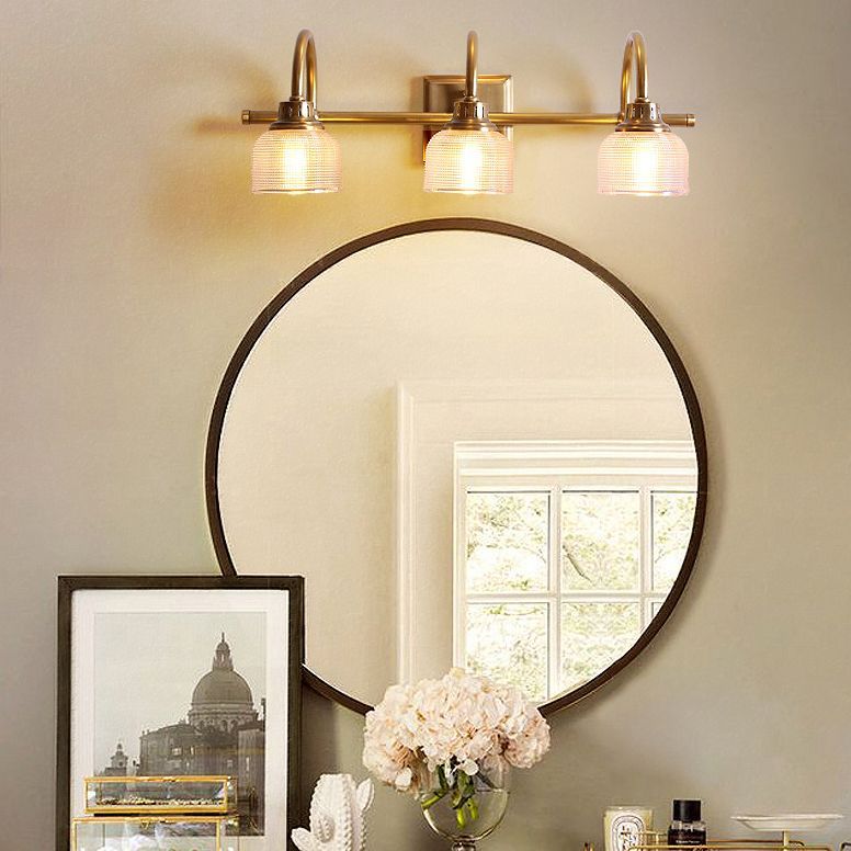 Lottie Prismatic Wall Lamp in a bathroom setting, featuring mirror