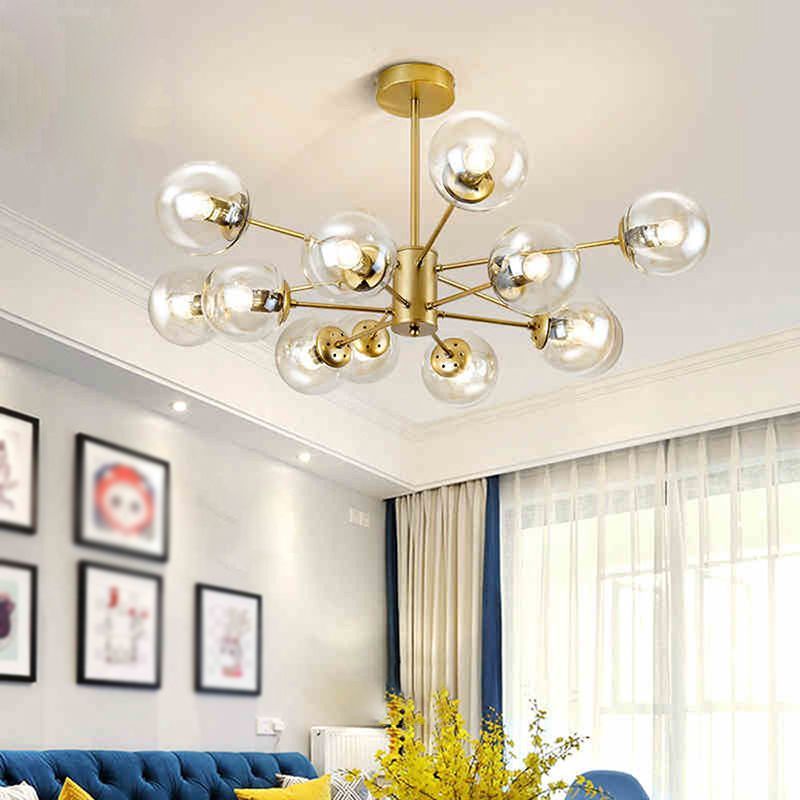 Valentina gold pendant light with glass spheres in living room