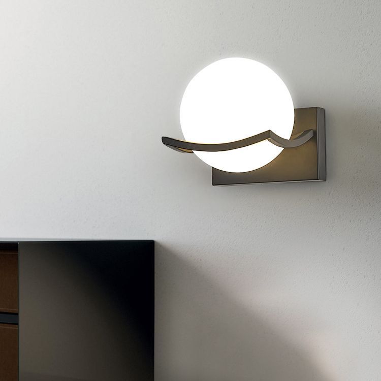 Valentina Vanity Wall Lamp illuminating bedroom