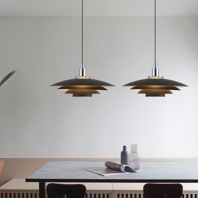 Modern black Morandi pendant lights above dining table