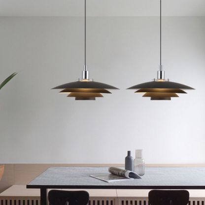 Modern black Morandi pendant lights above dining table