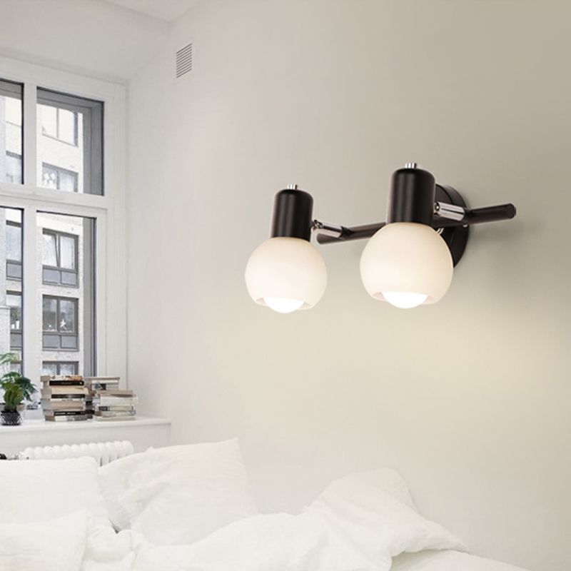 Valentina glass wall lamp in bedroom setting