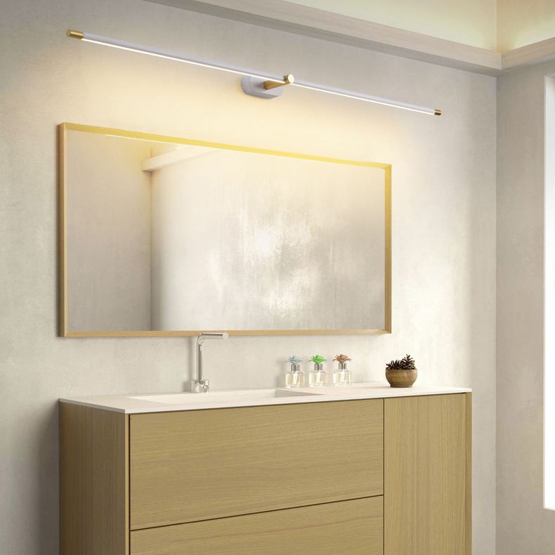Leigh wall lamp in bathroom. Modern minimalist lighting above mirror.