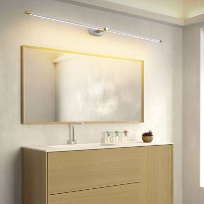 Leigh wall lamp in bathroom. Modern minimalist lighting above mirror.