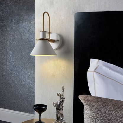White Morandi Horn Shape Wall Lamp in bedroom setting