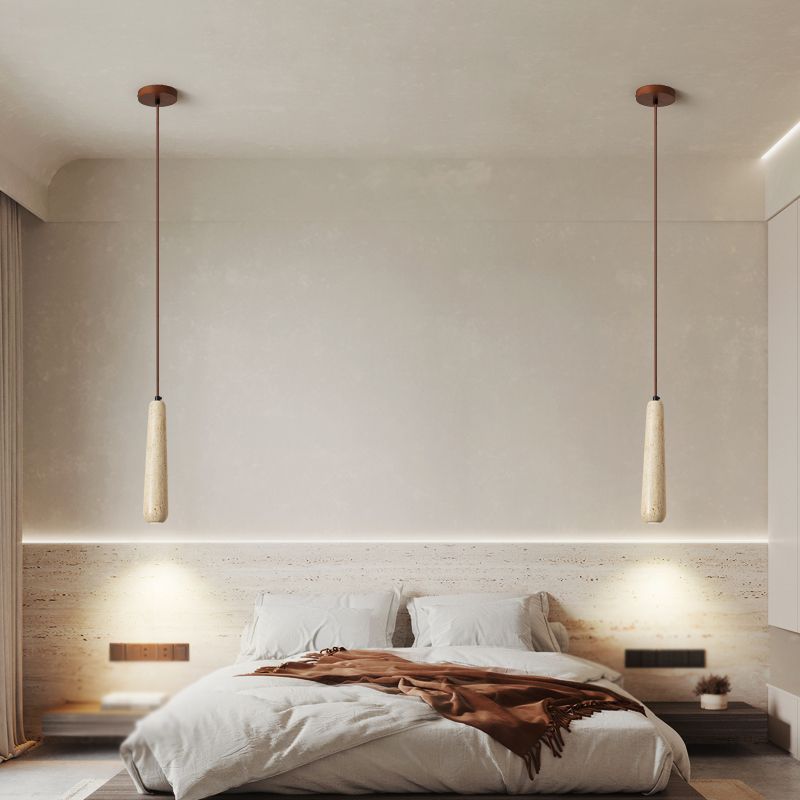 Bedroom with Ozawa wood pendant lights, minimalist design.