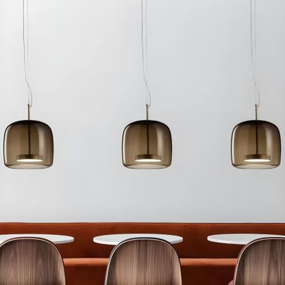 Smoky glass pendant light in a minimalist kitchen. Minimalist Cylindrical Metal/Glass Pendant Light, Kitchen