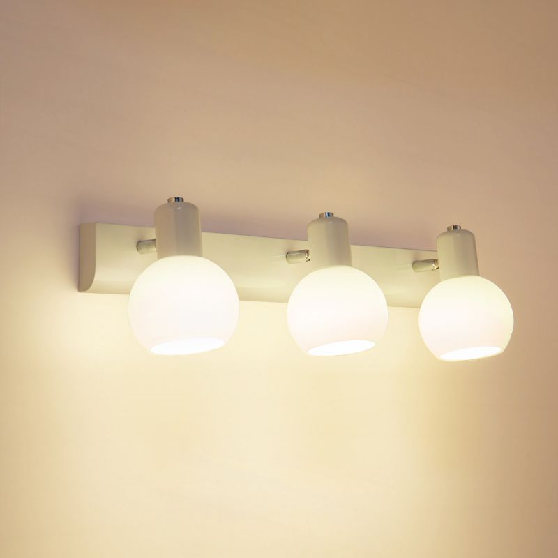 Valentina vanity wall lamp with three glass globes