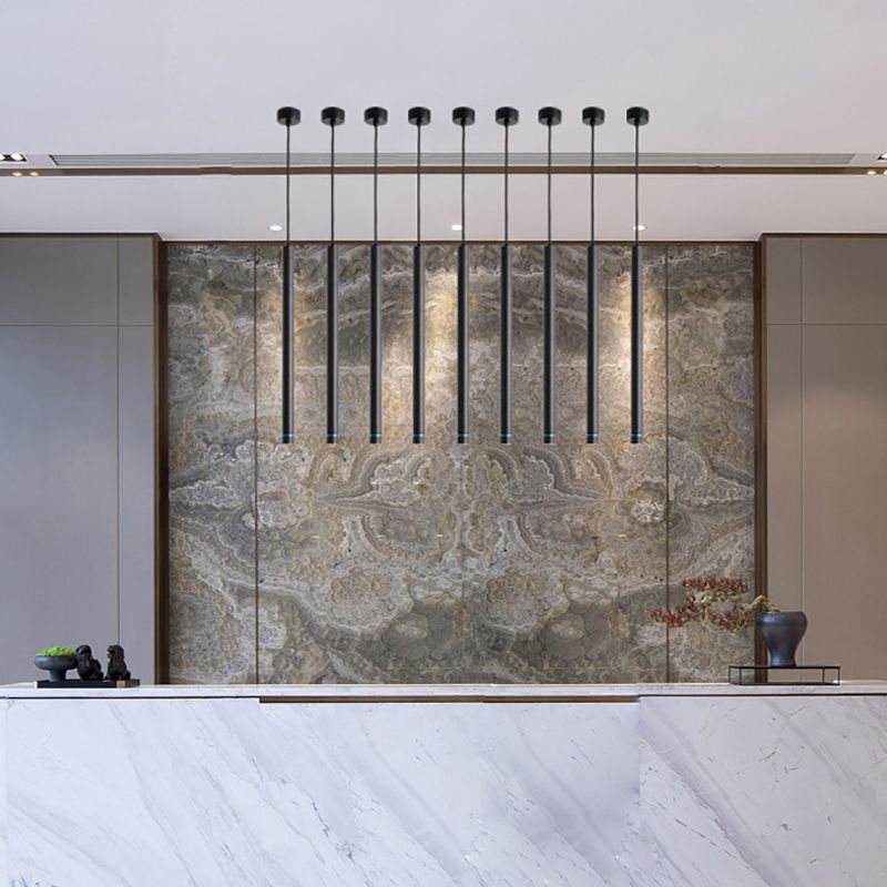 Edge minimalist pendant lights in modern dining space.
