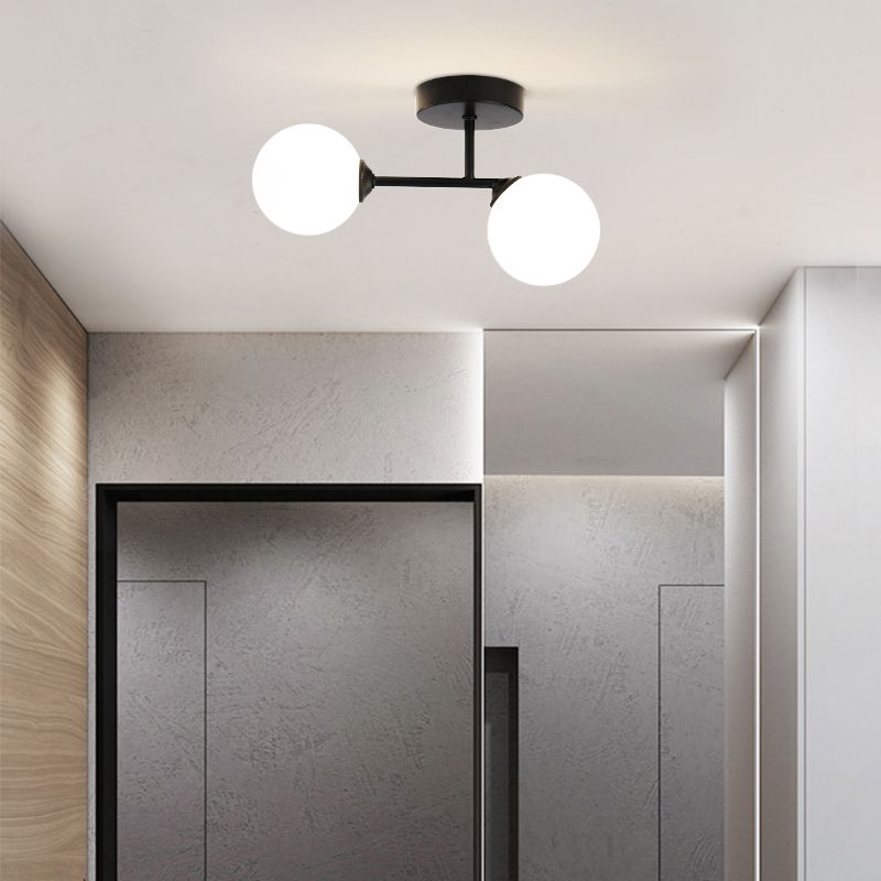 Modern black Valentina ceiling light with globe glass shades