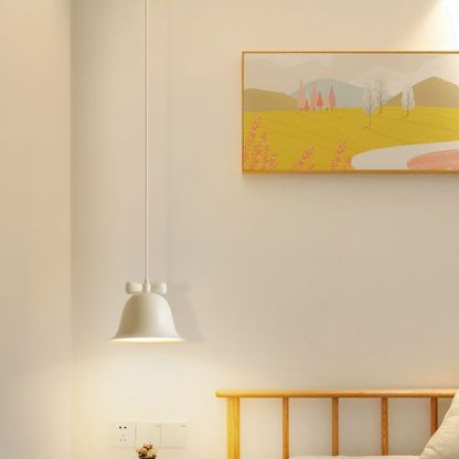 Carins bell pendant light in bedroom. Artistic lighting.
