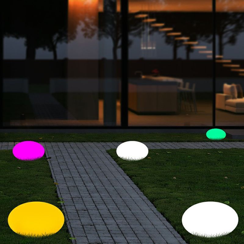 RGB LED Acrylic Outdoor Ground Lights on a Lawn