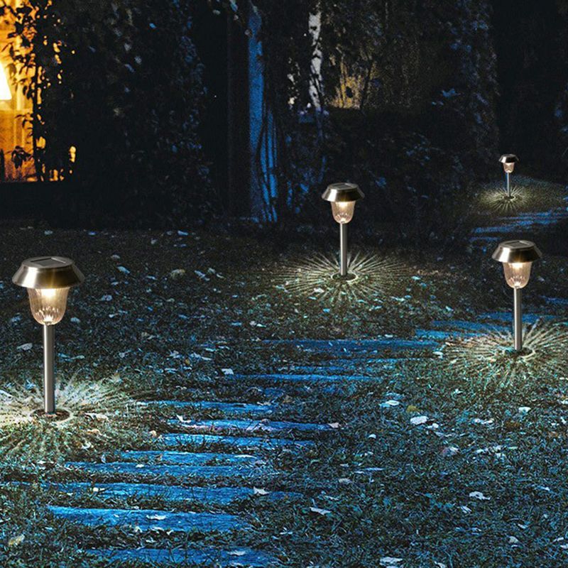 Pena Solar Bollard Lights illuminating a garden path at night