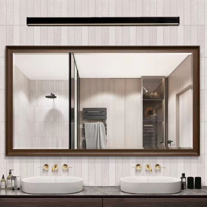 Edge Minimalist wall lamp above bathroom mirror. Las Sola lighting.