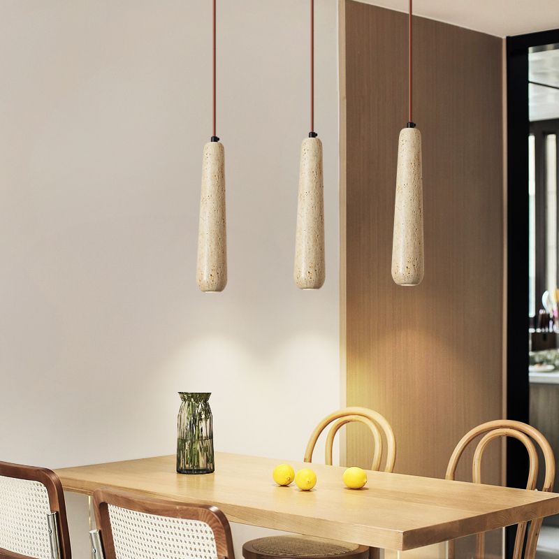 Ozawa wooden pendant light over dining table.