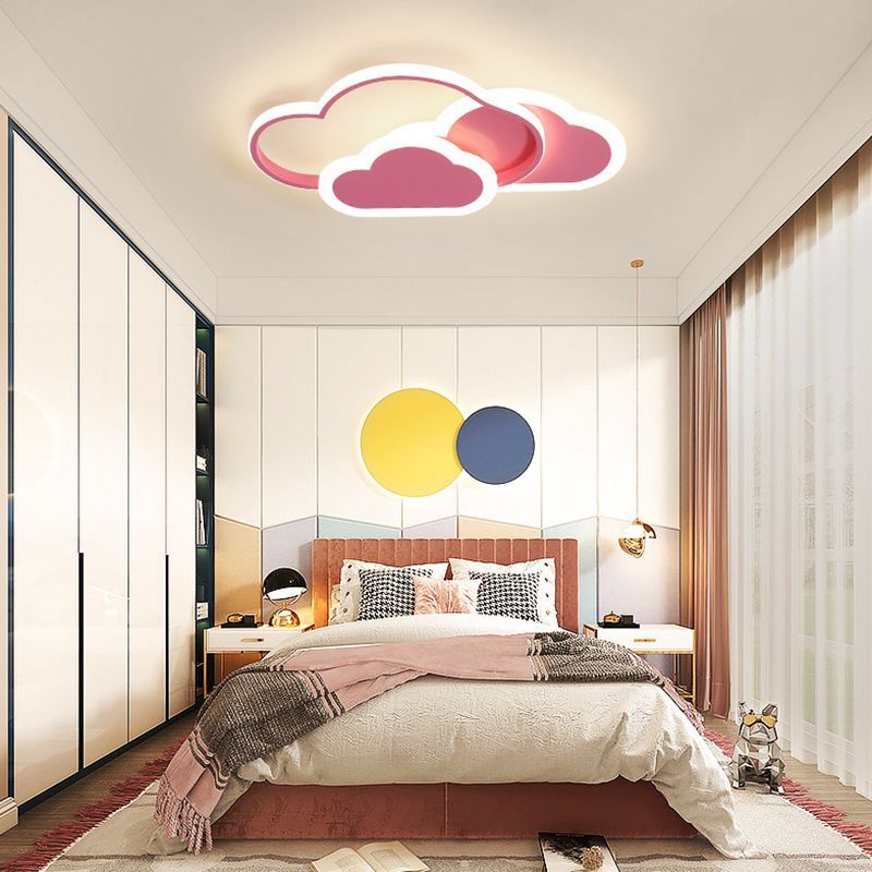 Pink cloud-shaped LED ceiling light in a child's bedroom