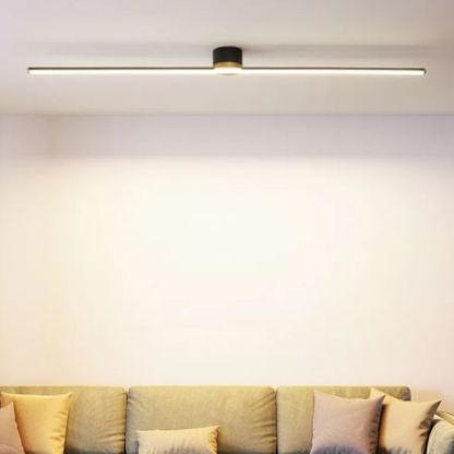 Modern Edge linear ceiling light above sofa. Las Sola lighting fixture.