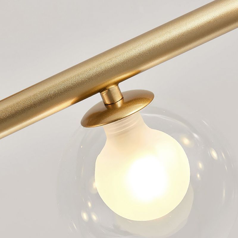Valentina pendant light detail, gold finish, glass globe shade