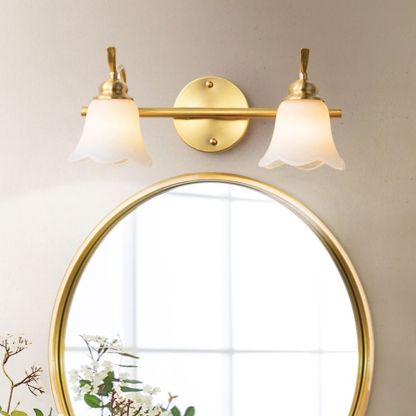 Félicie Gold Flower Wall Lamp over Mirror