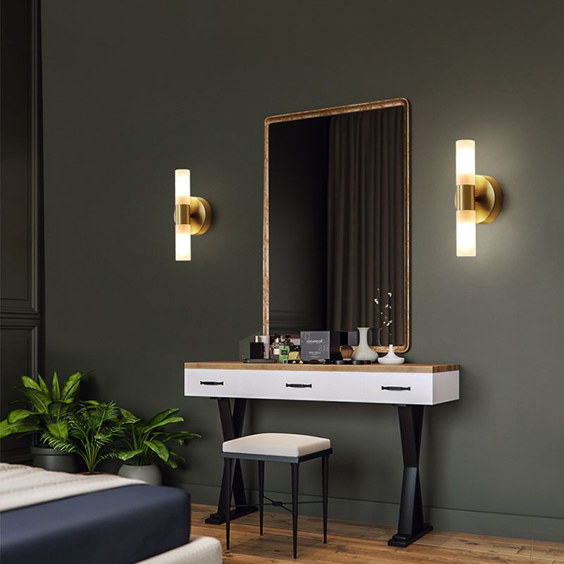 Bedroom with Leigh gold LED wall lamps and vanity