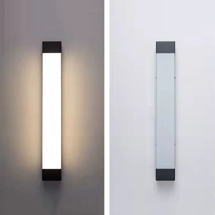 Orr linear outdoor wall lamp. Black frame, acrylic shade.