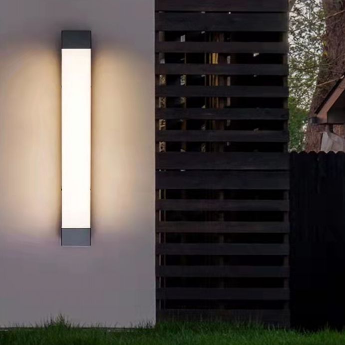 Orr minimalist linear outdoor lamp on white wall.