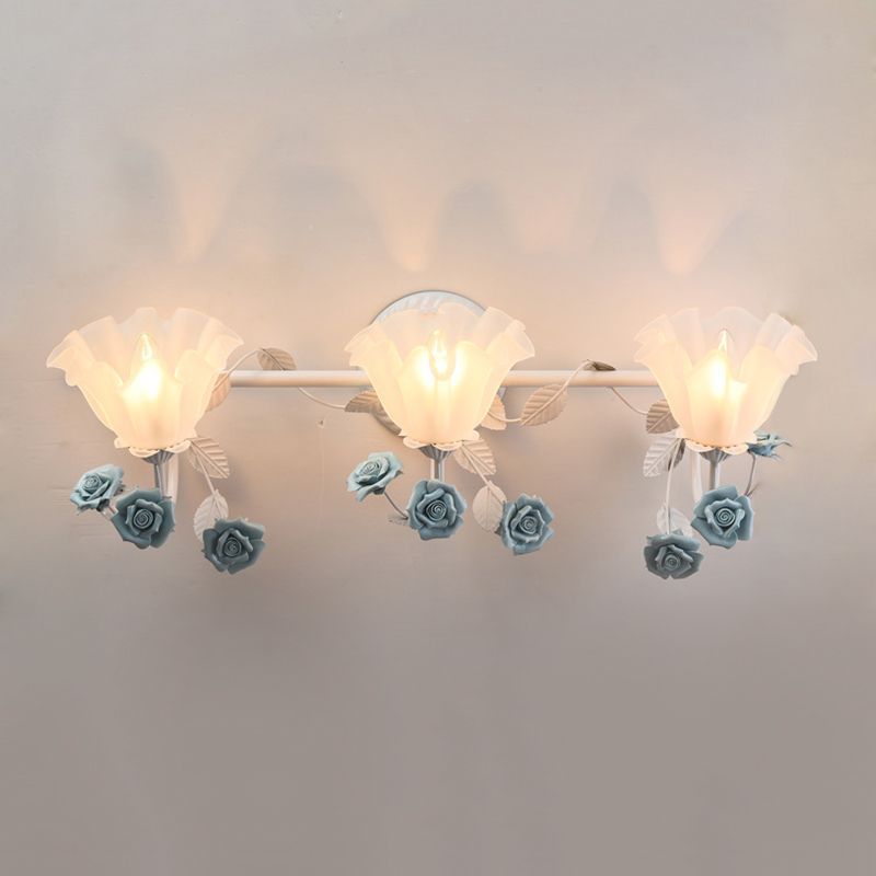 Félicie flower wall lamp with blue rose detailing