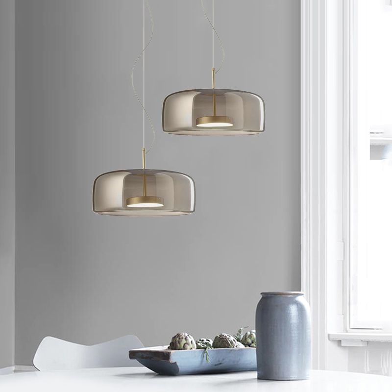 Smoky glass minimalist pendant lights over kitchen table. Minimalist Cylindrical Metal/Glass Pendant Light, Kitchen