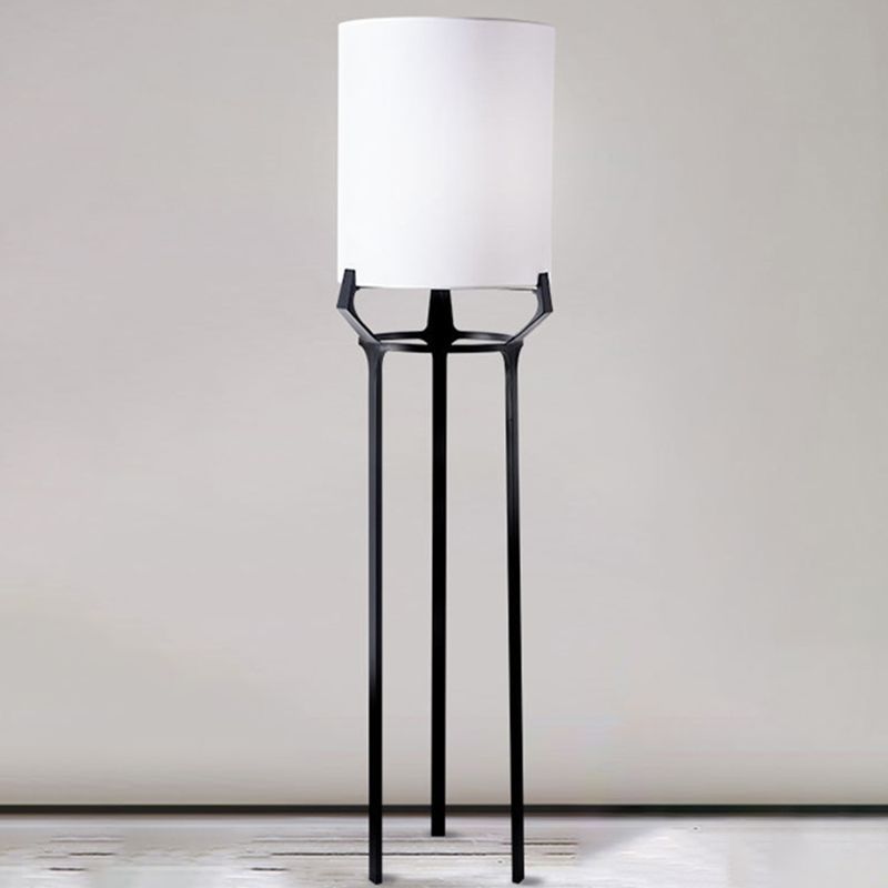 Eryn floor lamp: Black metal tripod & white fabric shade.