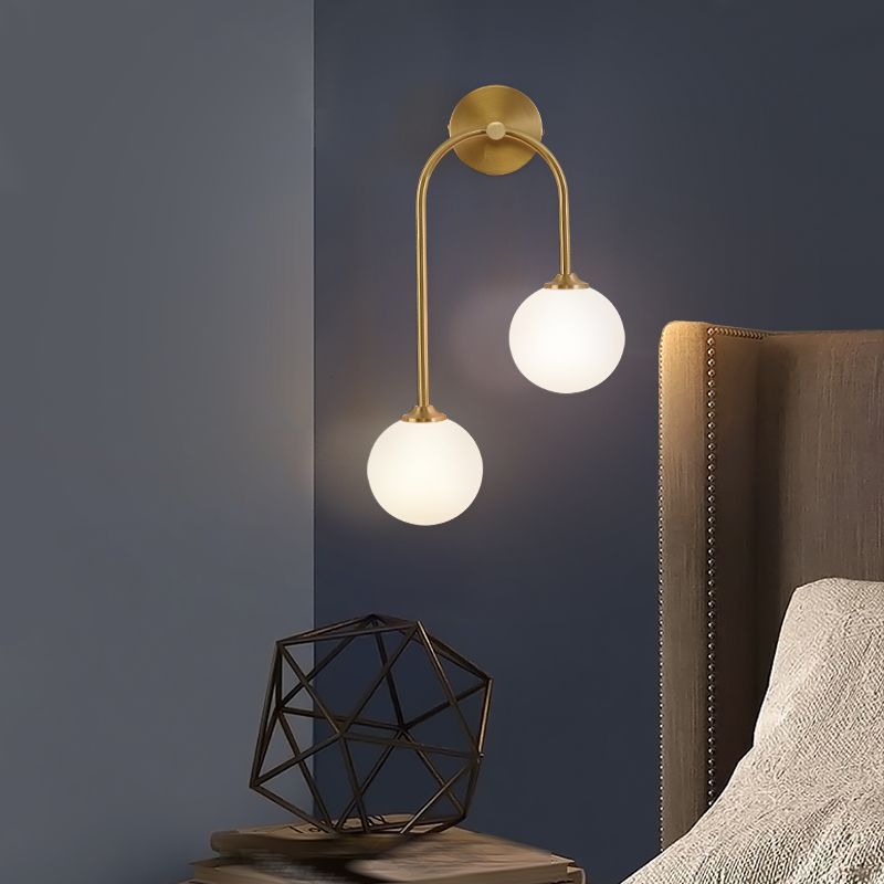 Valentina Brass Globe Wall Lamp in living room