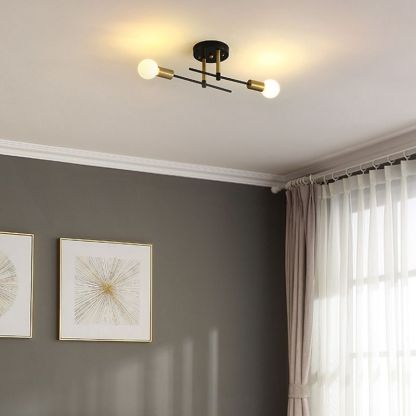 Modern Valentina ceiling light fixture in a dining room, metal and glass