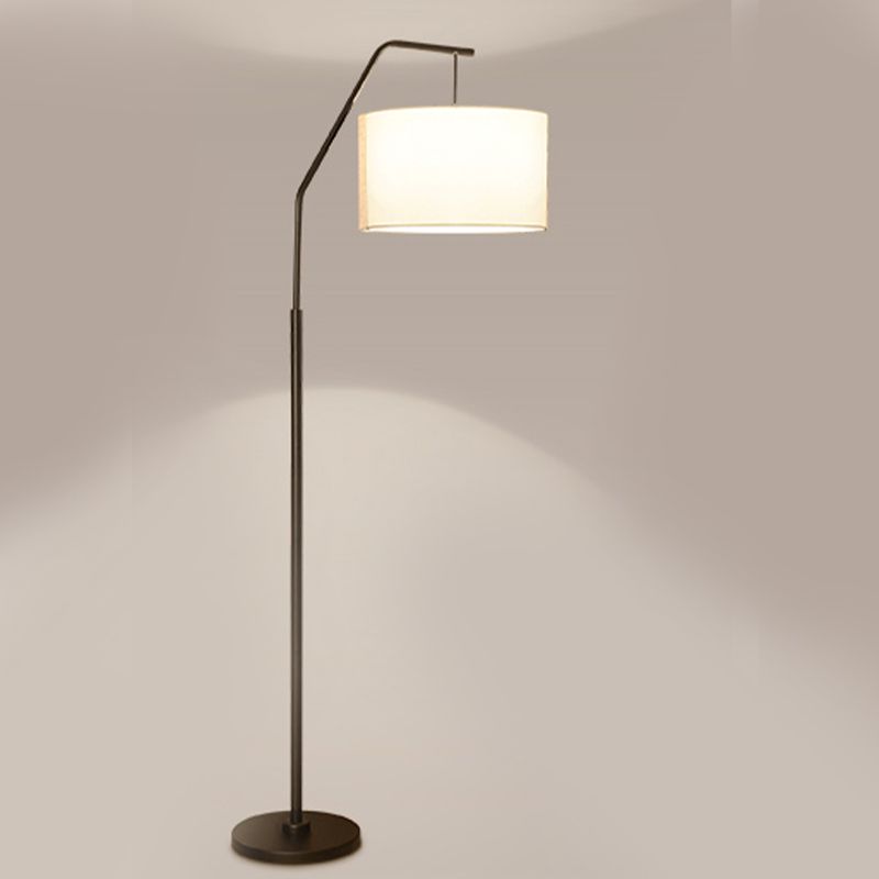 Eryn cylinder floor lamp with ambient lighting.