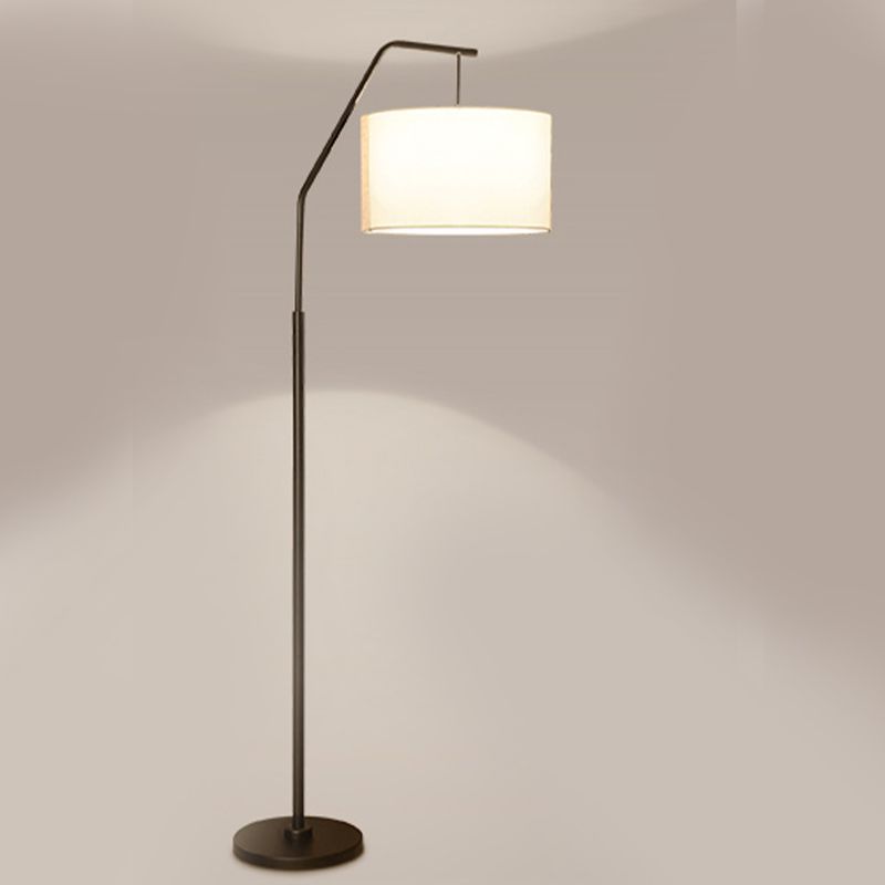 Eryn cylinder floor lamp with ambient lighting.