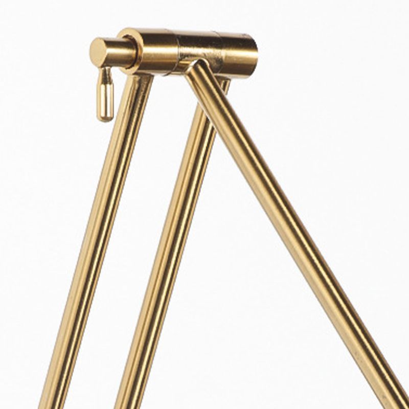 Freja brass wall lamp adjustable joint.