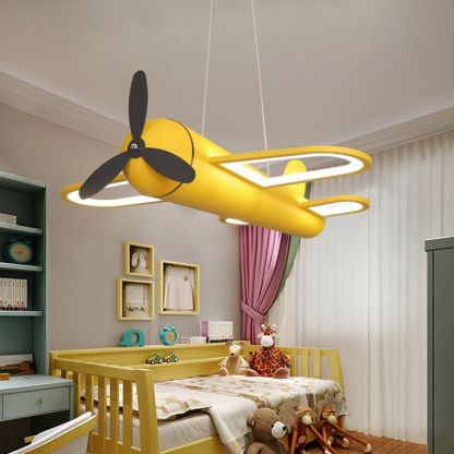 Yellow airplane pendant light in children's room