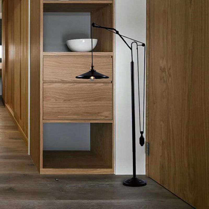 Black metal Alessio floor lamp, modern lighting solution.