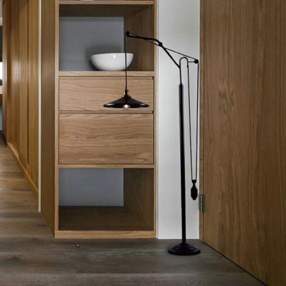 Black metal Alessio floor lamp, modern lighting solution.