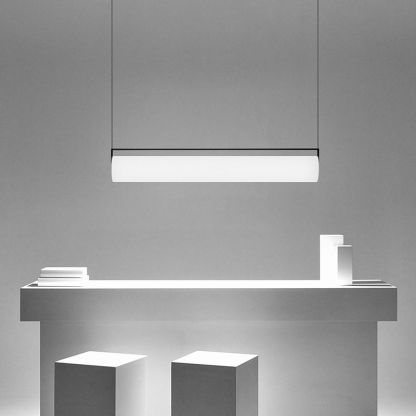 Cylindrical pendant light. Modern linear lighting fixture.