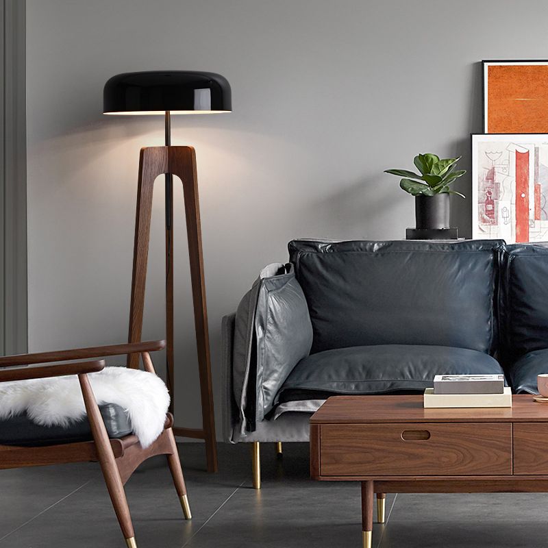 Modern wooden tripod floor lamp in living room