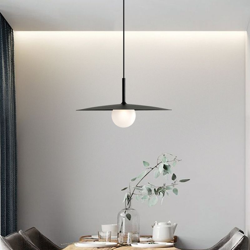 Modern Carins pendant light over dining table