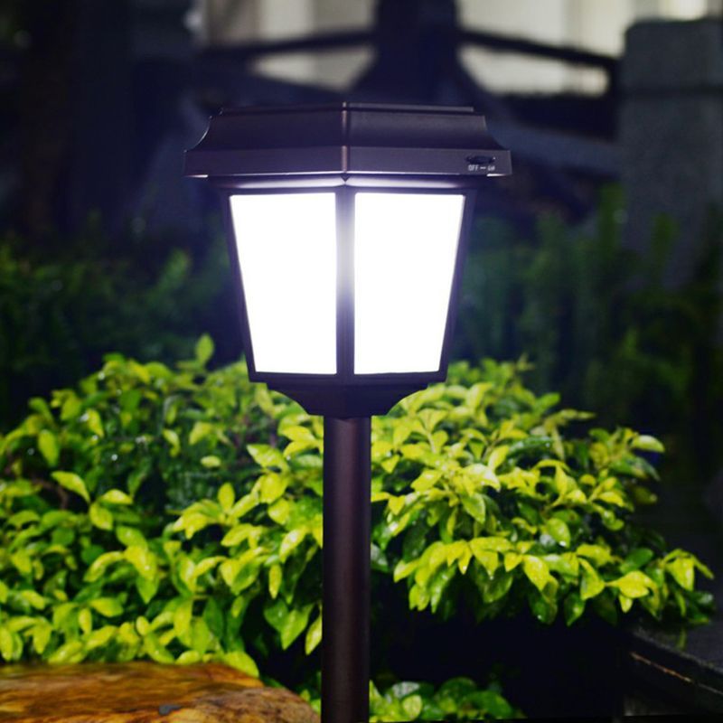 Pena Solar Bollard Light illuminating garden,Vintage style