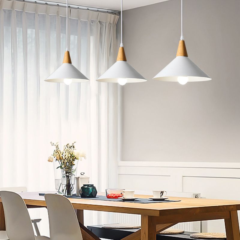 Modern dining room with white pendant lights