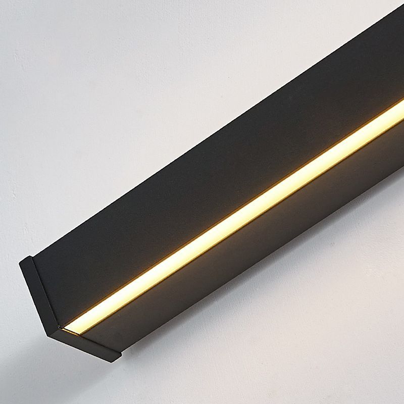 Edge minimalist wall lamp detail. Modern metal and acrylic lighting.