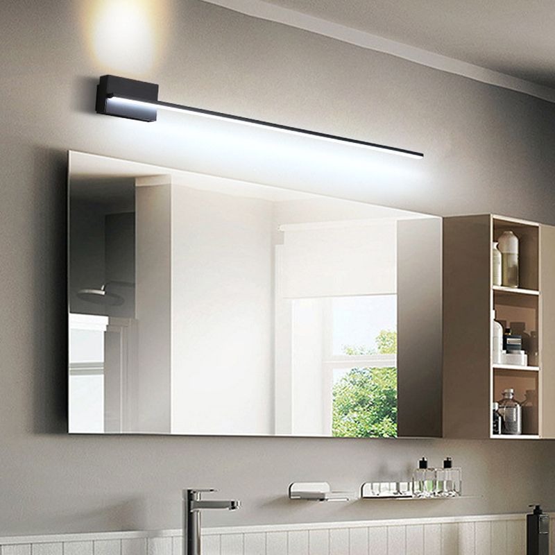 Modern metal vanity light above mirror. Edge minimalist style.